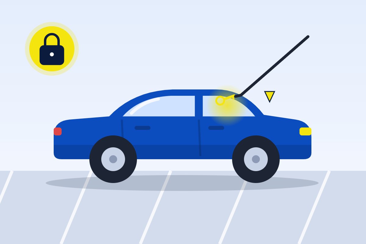 Locksmith opening a locked car door with vehicle entry tools