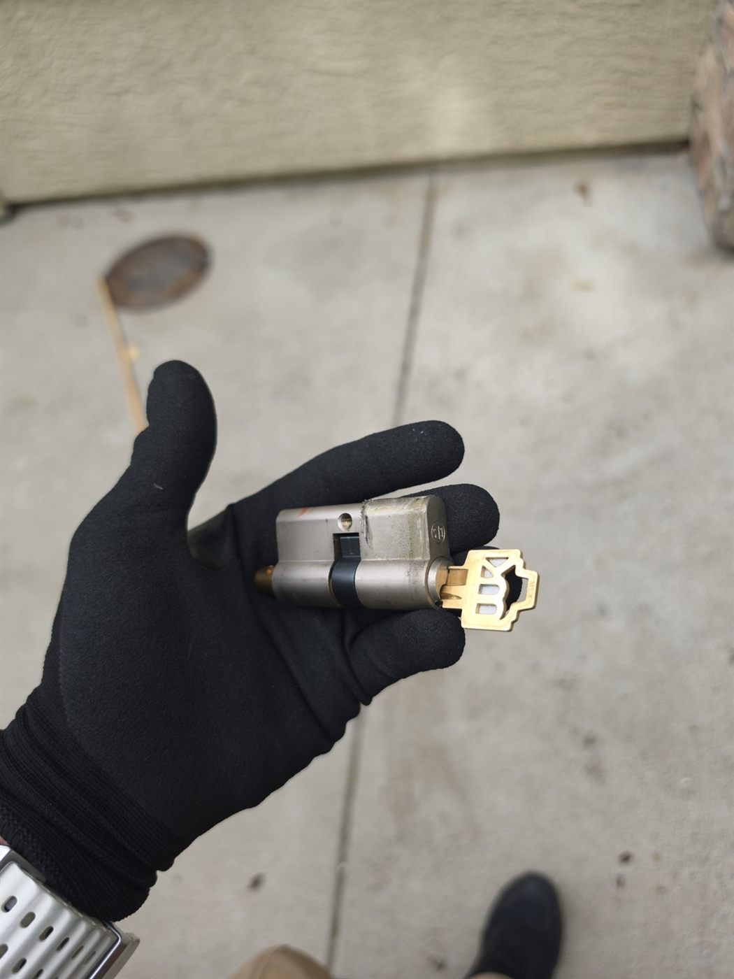 Euro profile lock cylinder with key, removed for service