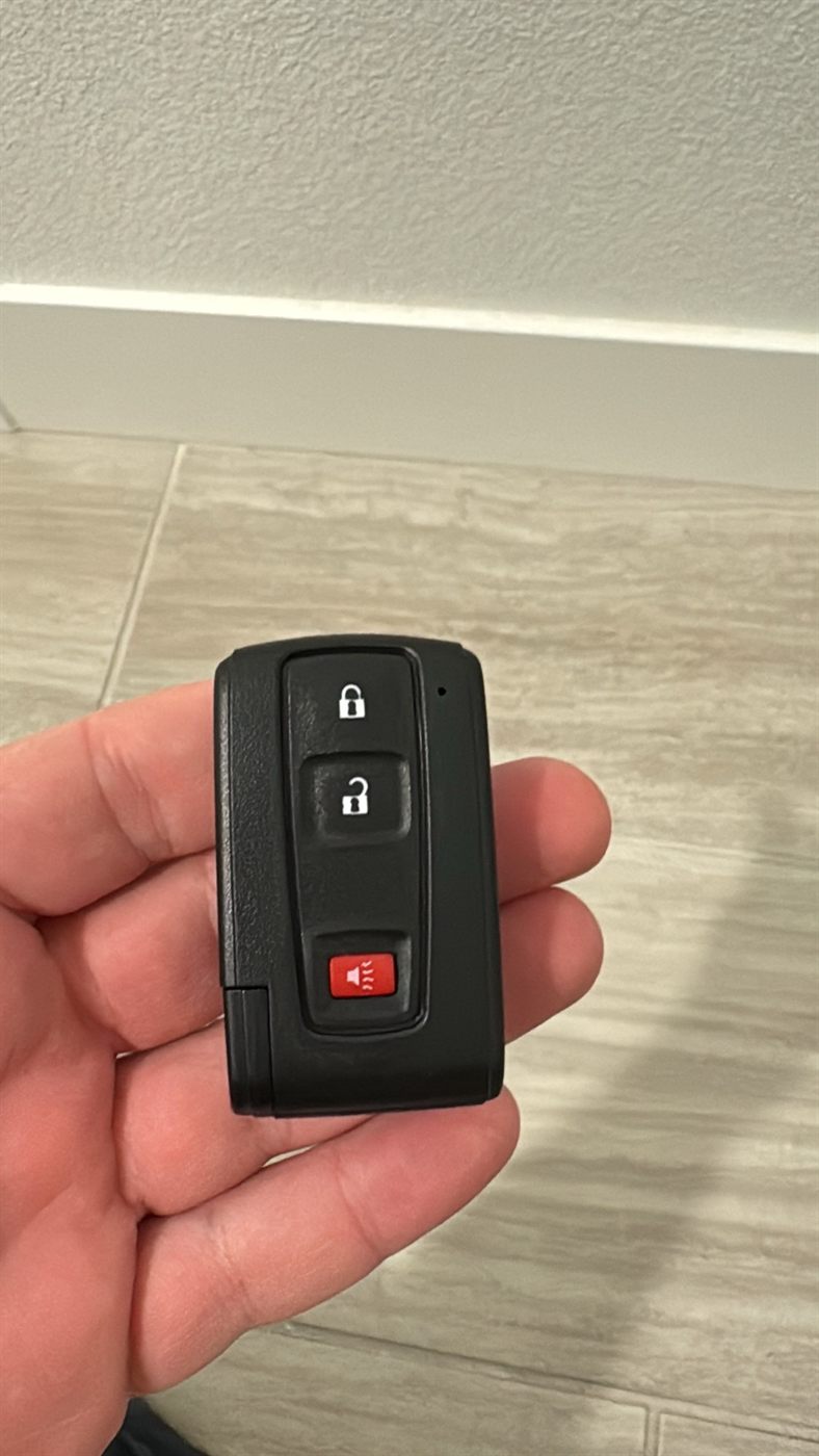 Smart key fob with lock, unlock, and panic buttons