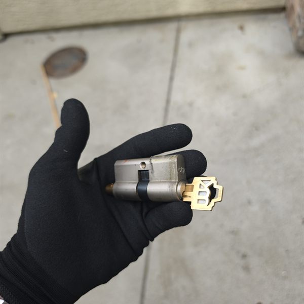 Euro profile lock cylinder with key, removed for service