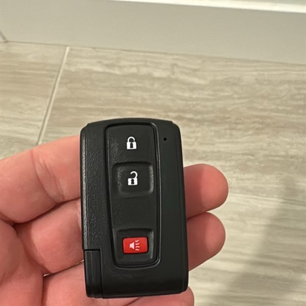 Smart key fob with lock, unlock, and panic buttons